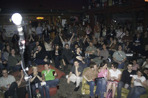 Looking out at the audience at Fray Cafe in Austin